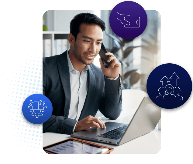 Professional using smartphone and laptop, empowering staff, streamlining payments, boosting productivity digitally