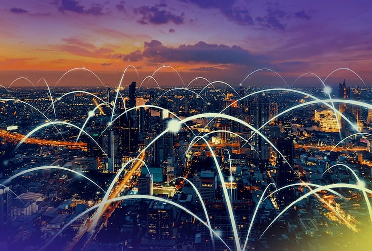 Network of city lights connected by blue beams representing the nationwide Shared Branch Network